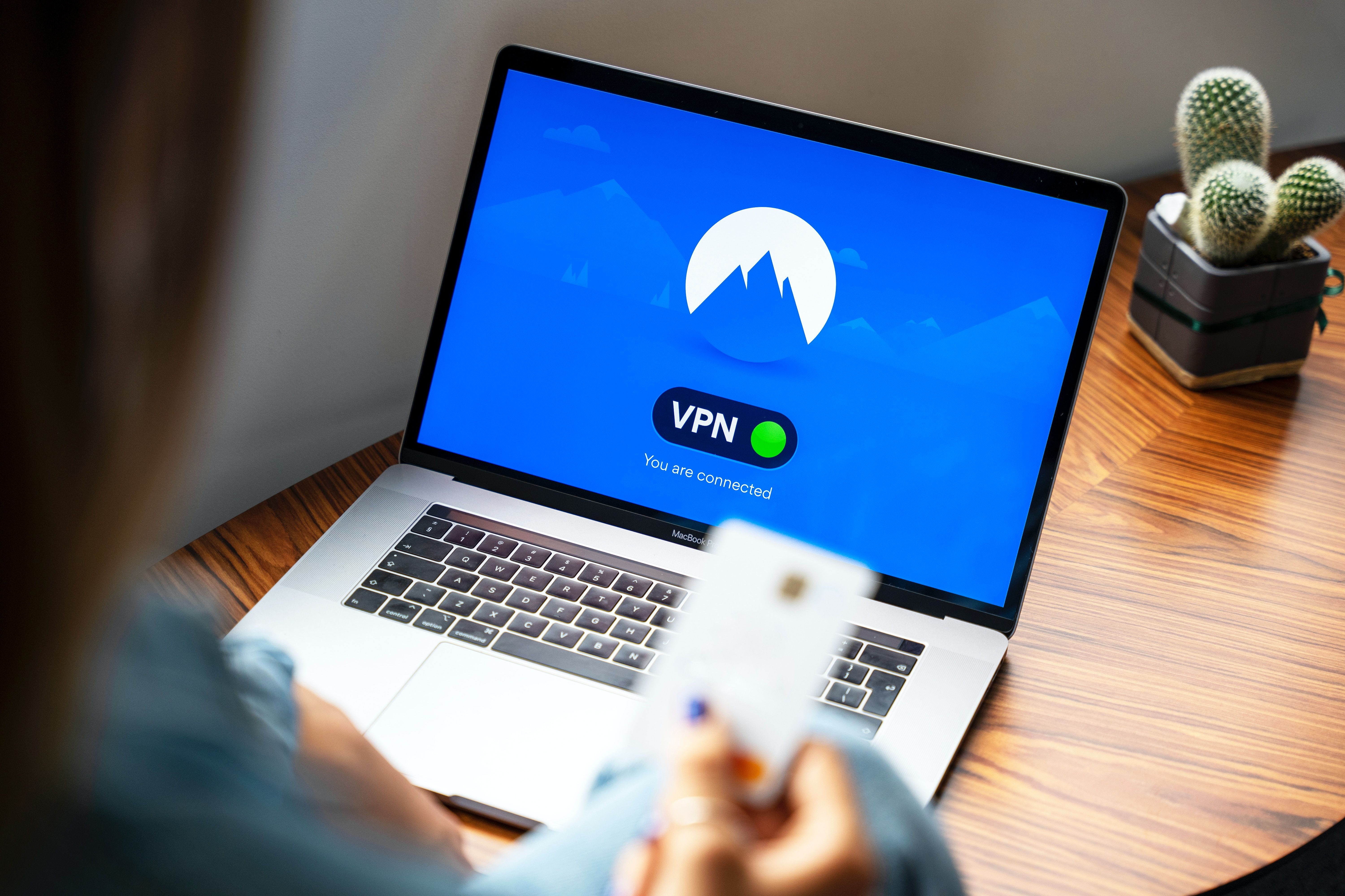 Person using VPN on laptop