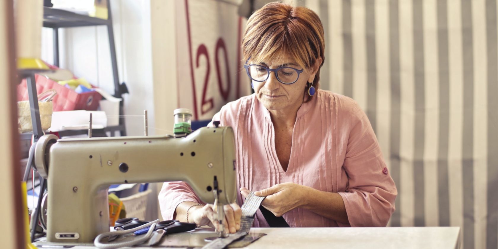 woman using a sewing machine