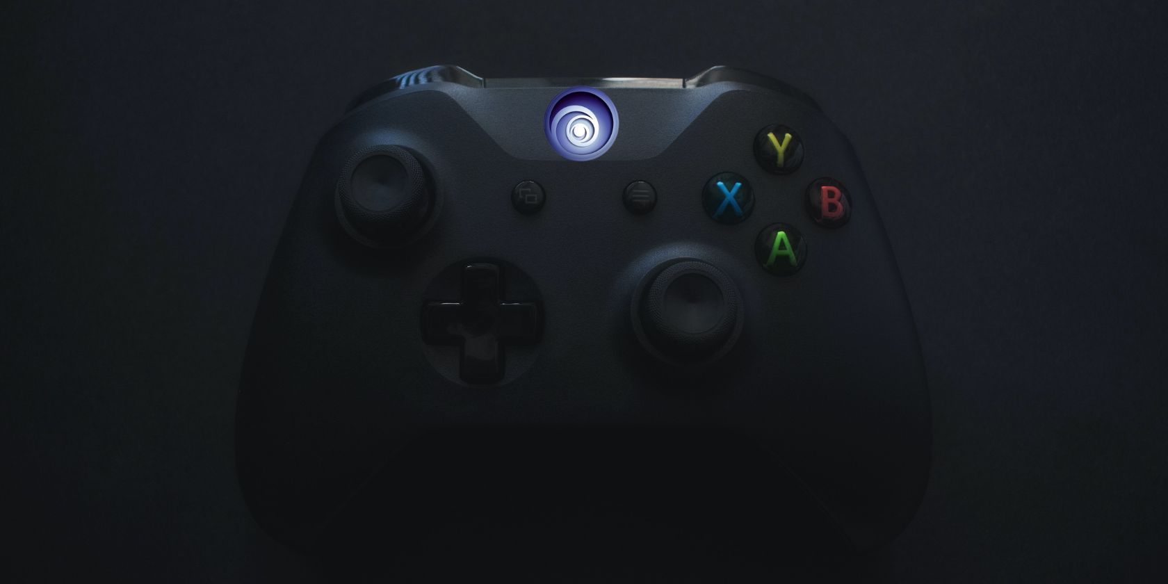 An Xbox controller with the Ubisoft logo in place of the Xbox 