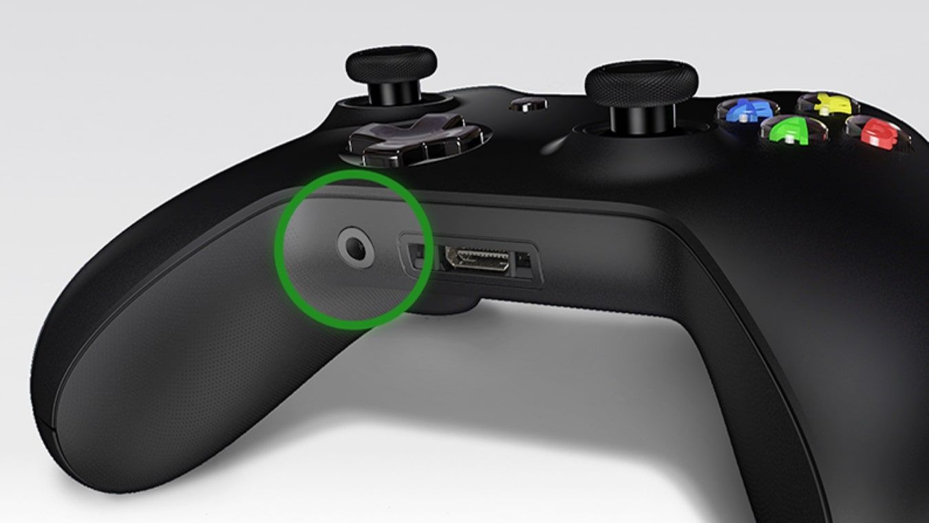 A promotional image of a 3.5mm headphone jack port on an Xbox One controller 