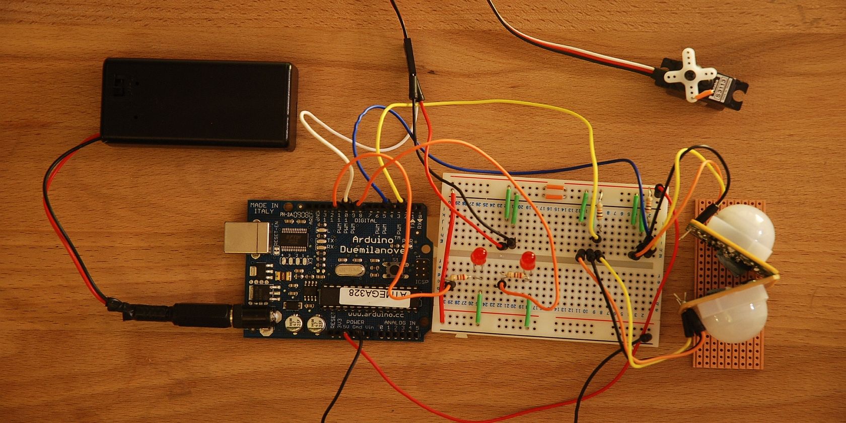 Motion sensor circuit on breadboard with Arduino