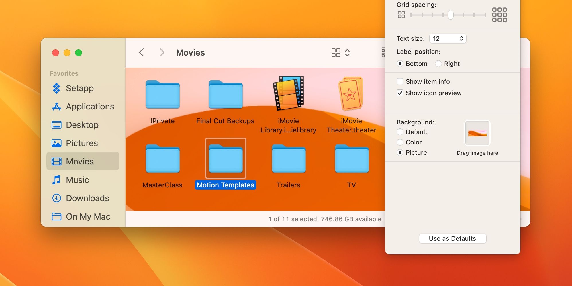 A Finder window with a custom background image on macOS Ventura