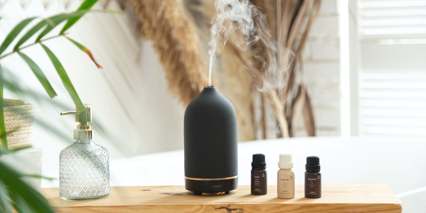 aromatherapy device on a table with essential oils