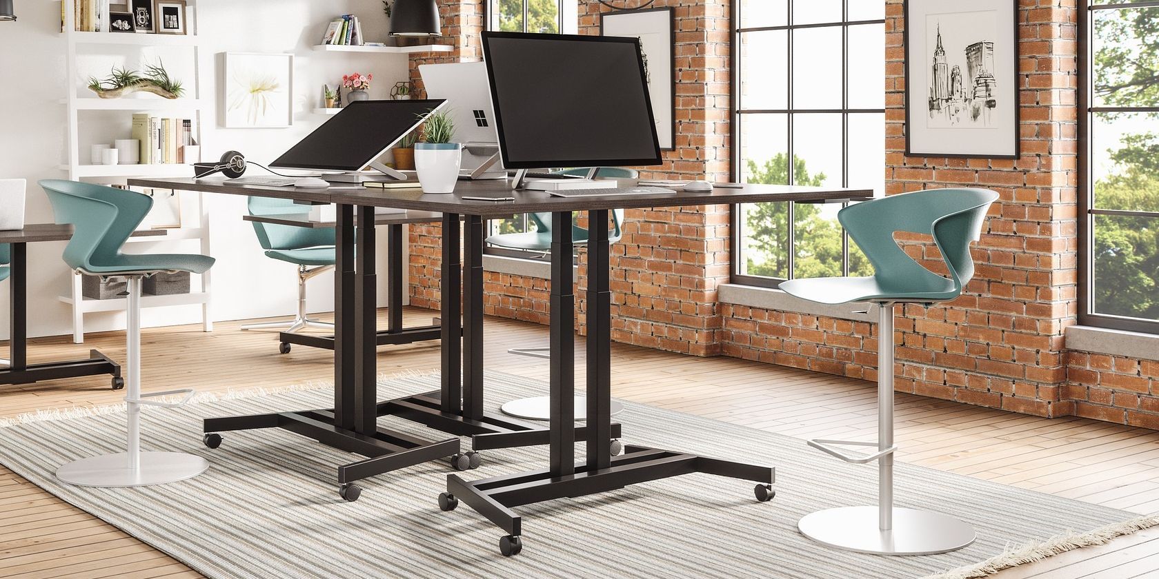 three standing desks accompanied by three high chairs, positioned in an office