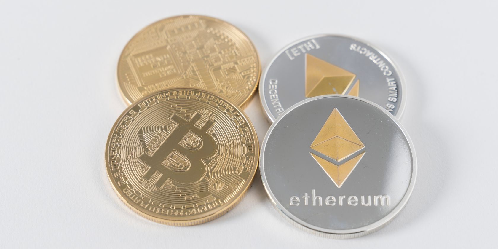 pairs of bitcoin and ethereum coins side by side
