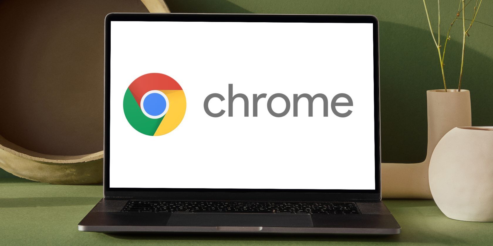 chrome logo on white laptop screen placed on desk