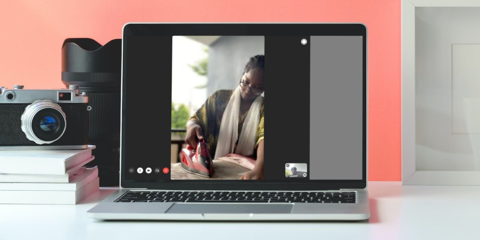 FaceTime call on a MacBook next to a camera