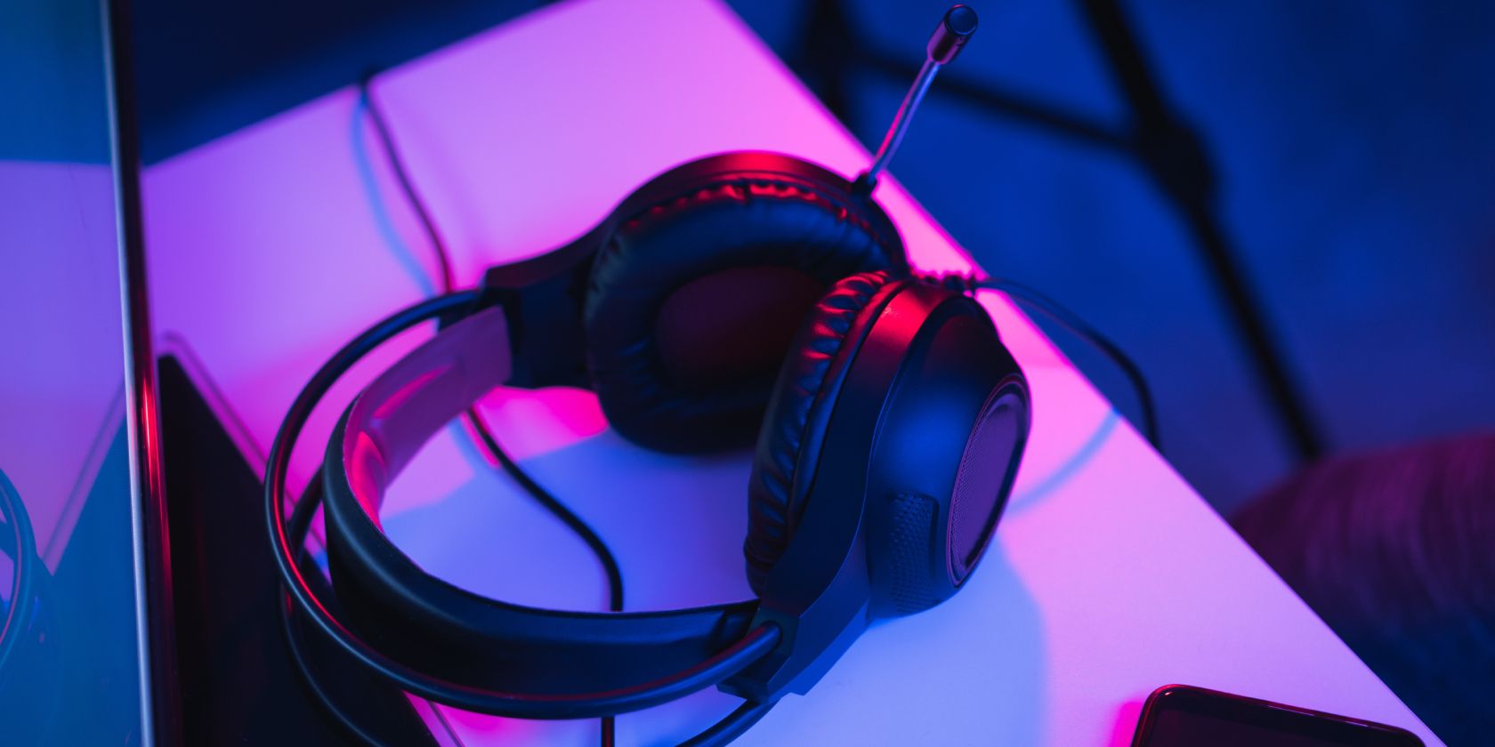Gaming headphones resting on tabletop