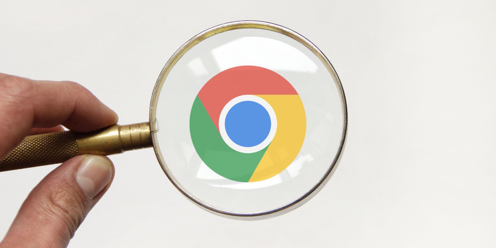 An image of the Google Chrome Icon Inside a Magnifying Glass