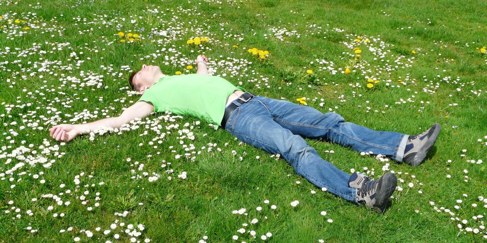 High Angle View of a man Lying Down on Grass