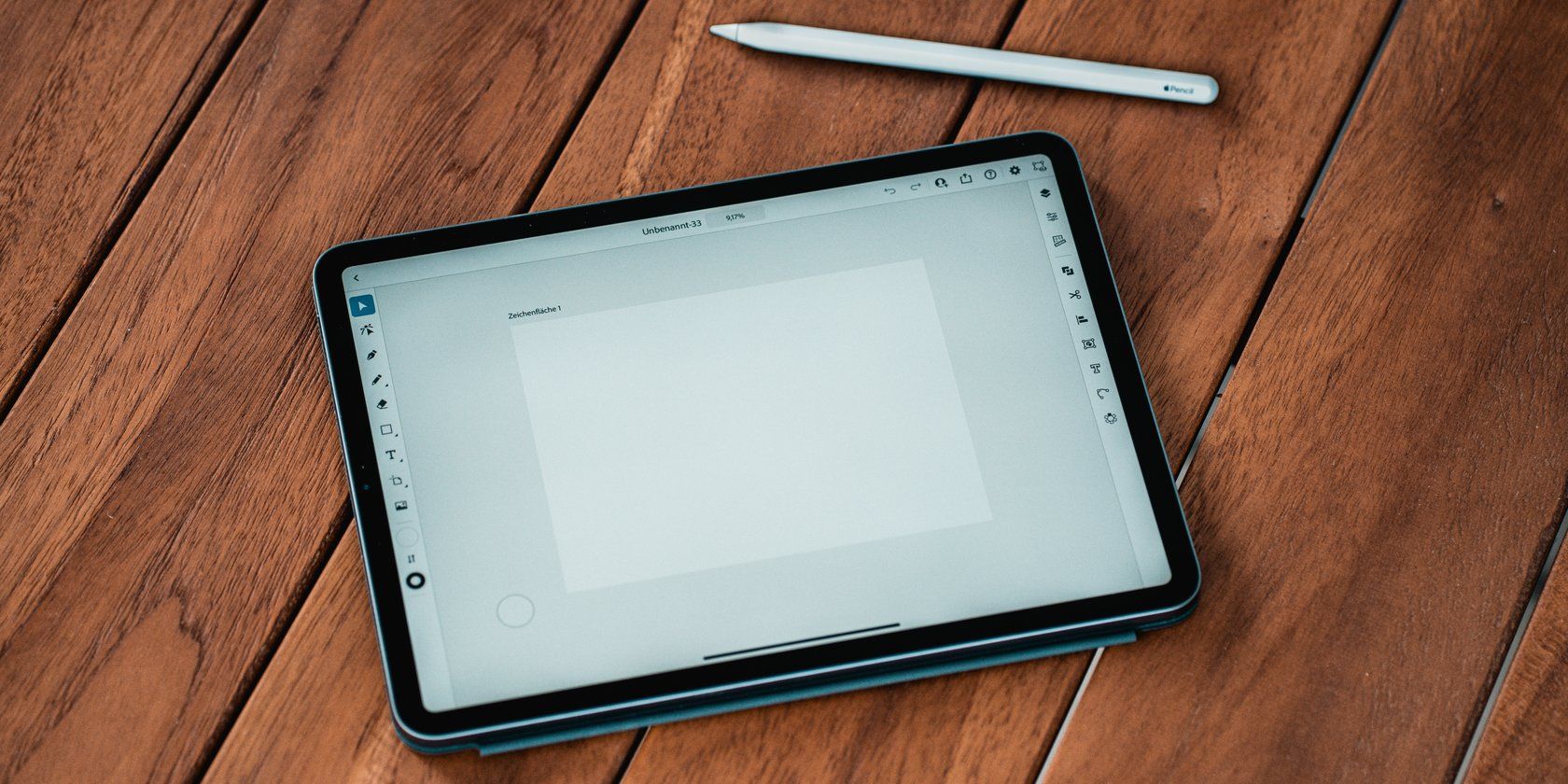 iPad with Apple pencil lying on a tablet