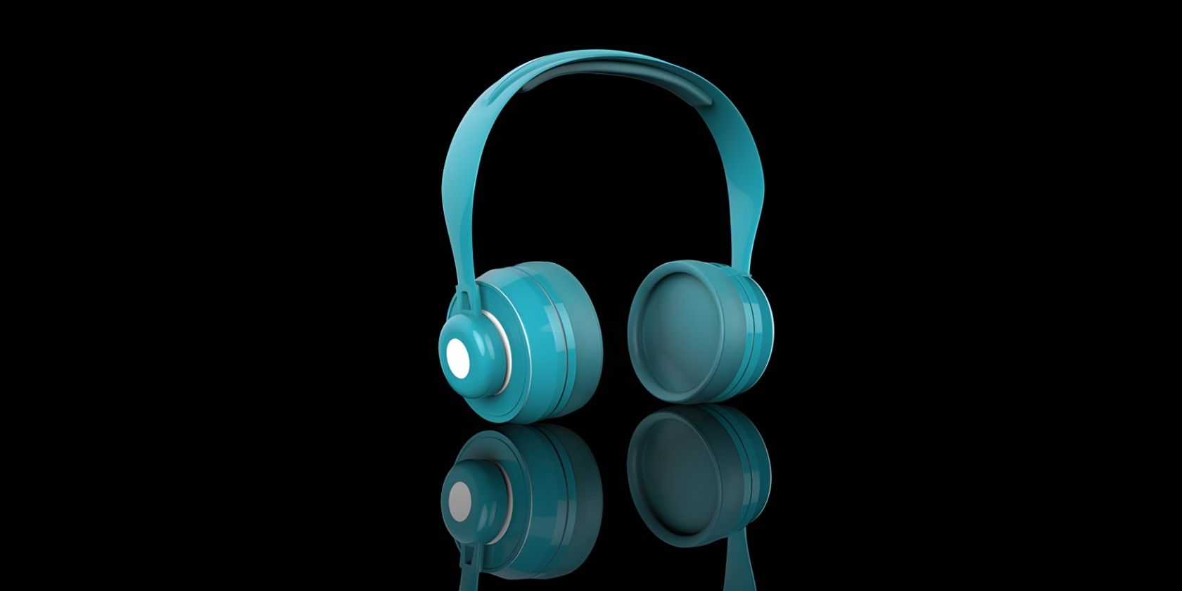 Teal colored headphones against black background.