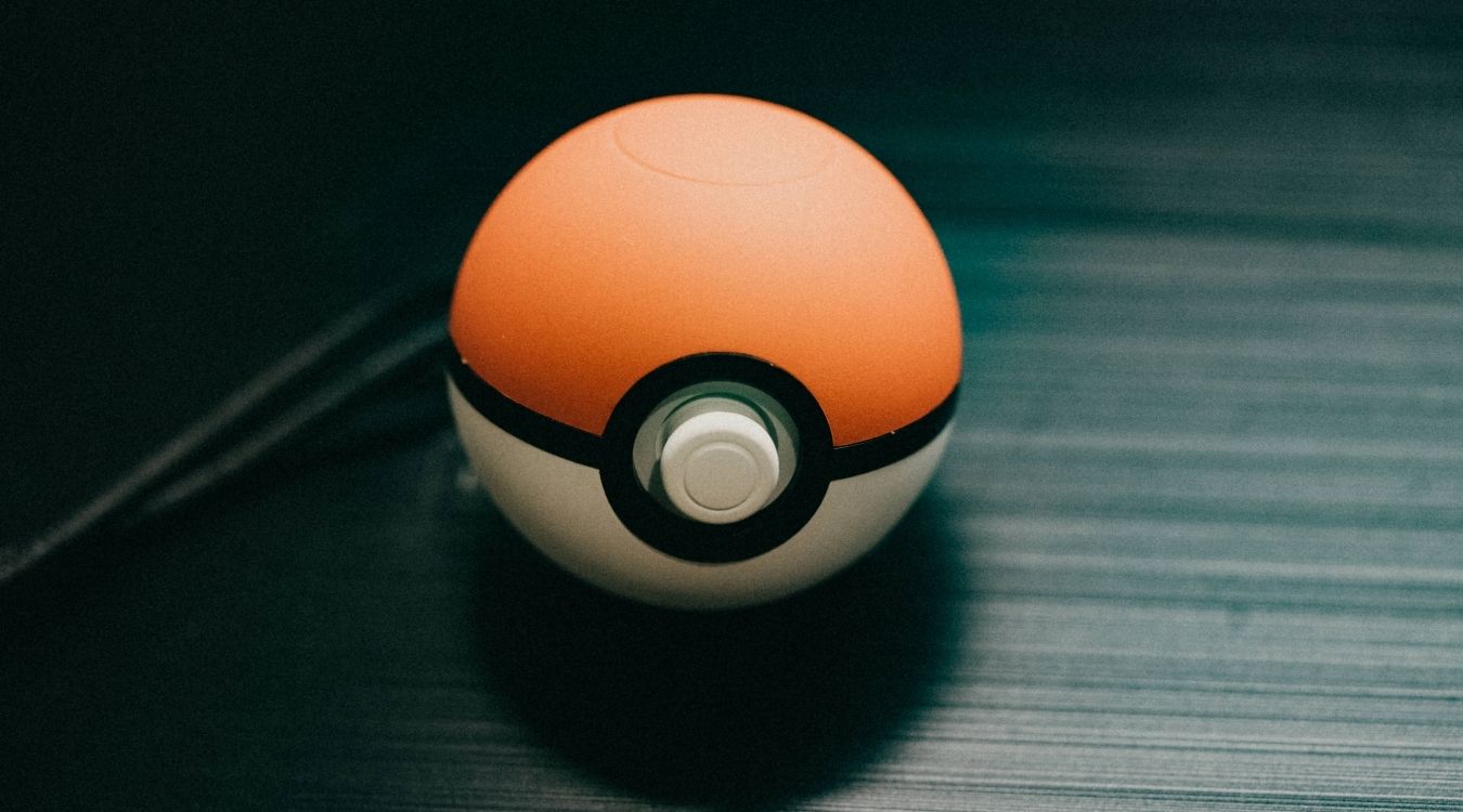 A photograph of a Pokeball themed controller for Nintendo Switch