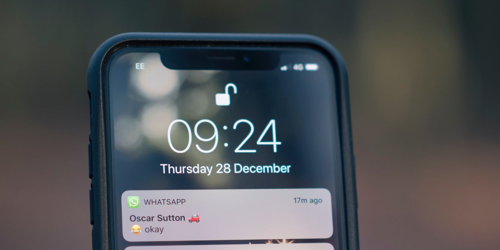 iPhone unlocked using Face ID with a WhatsApp notification