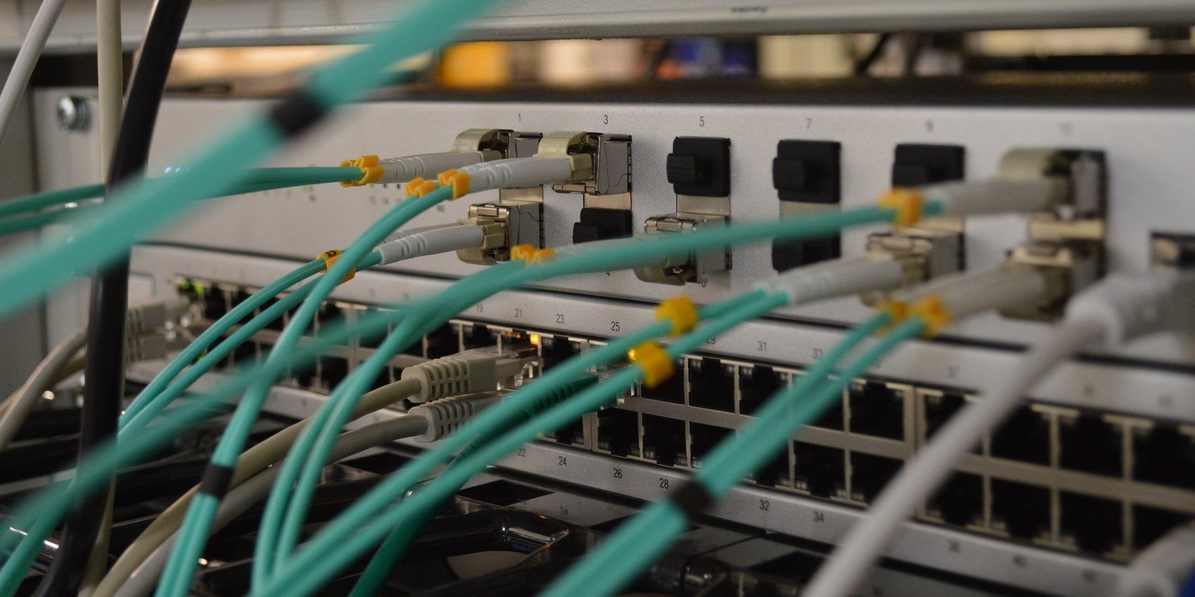 Cables in a white ethernet switch.