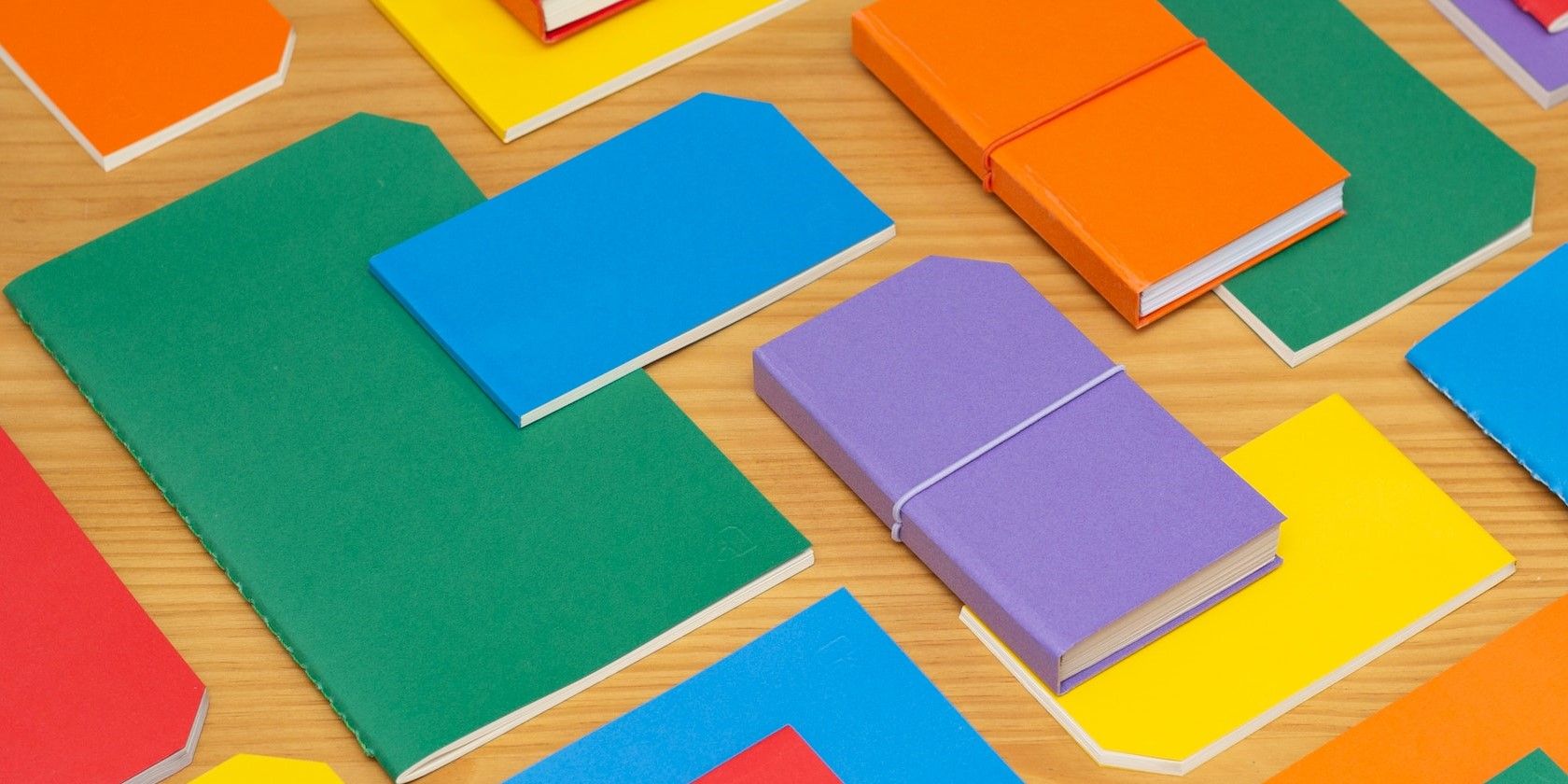 Folders of Different Colors on a Table