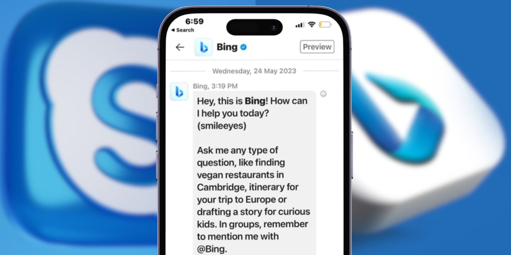 Bing Chat on Skype Open on Smartphone in Front of Bing and Skype Blurred Logo