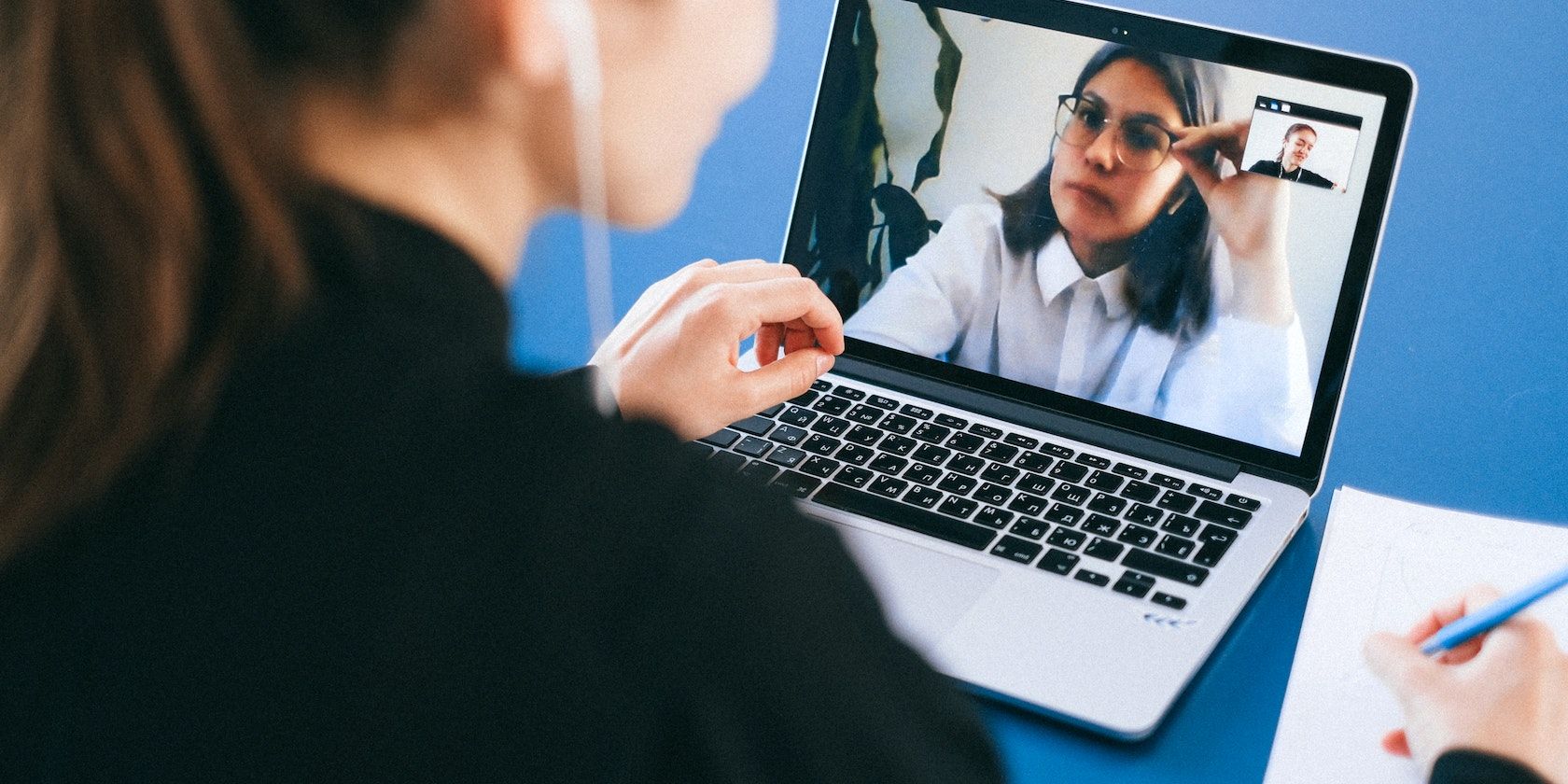 Two corporate women on a video call