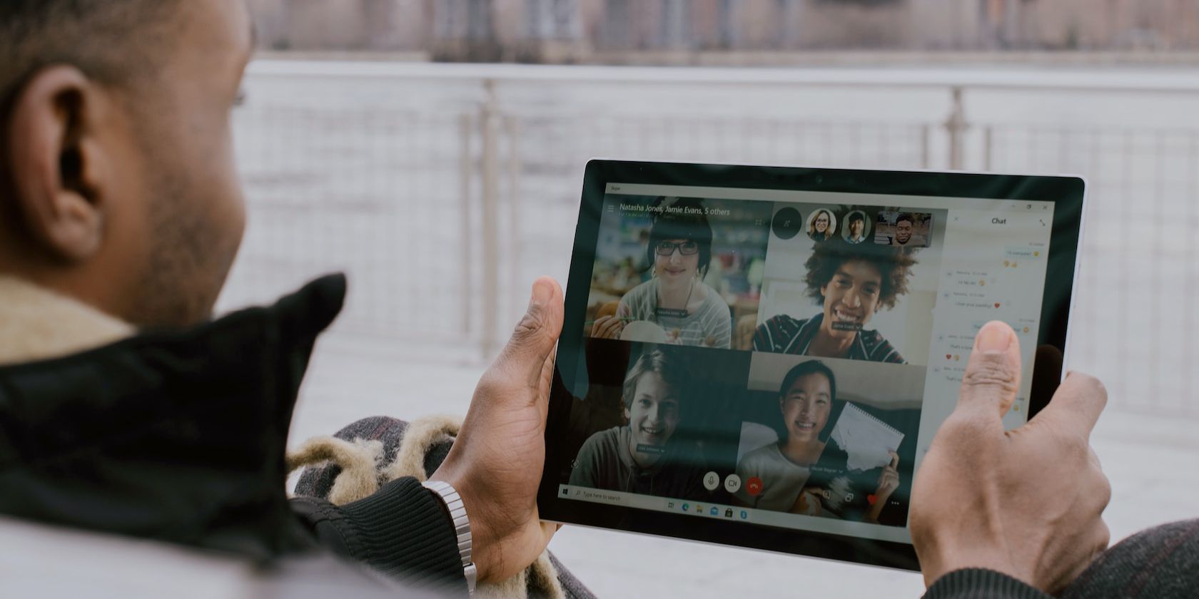 man on a group video call