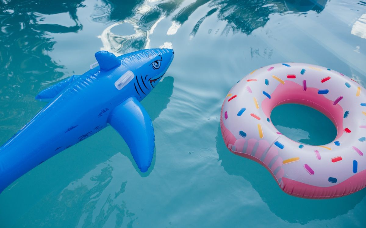 Balloon shark looking at balloon doughnut