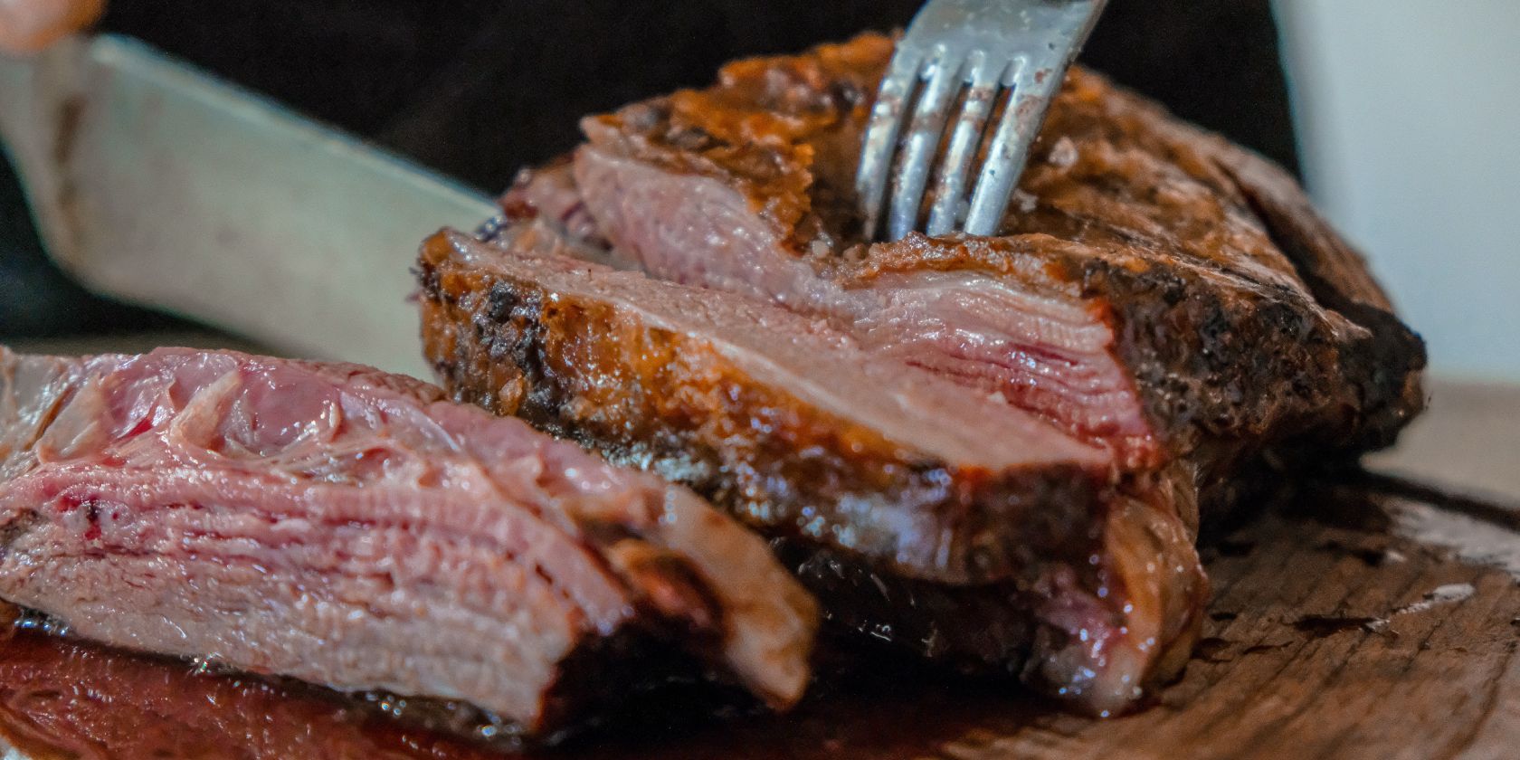 Close up of juicy steak on cutting board
