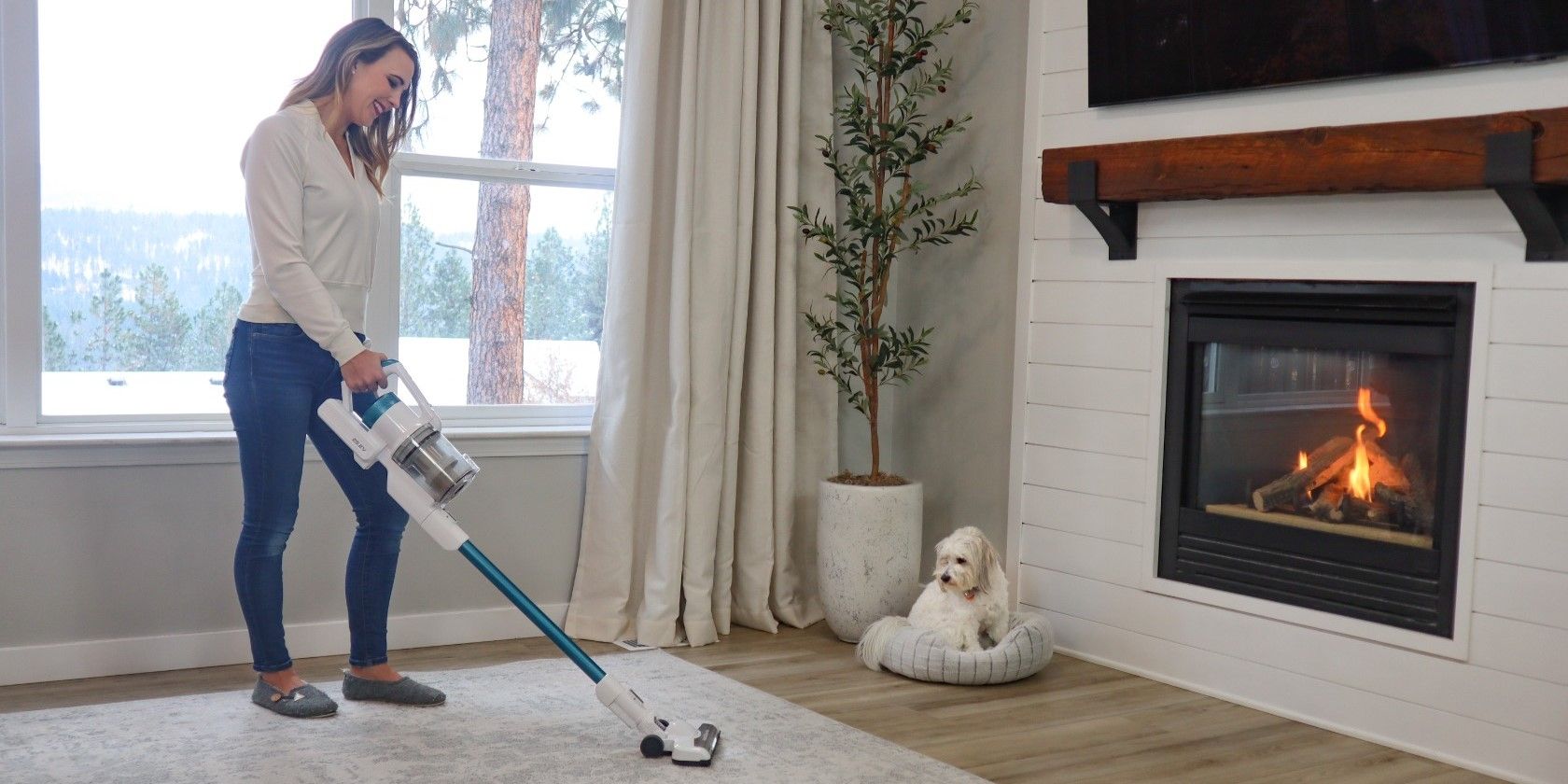 Woman Cleaning a Carpet With Eureka RapidClean Pro Vacuum