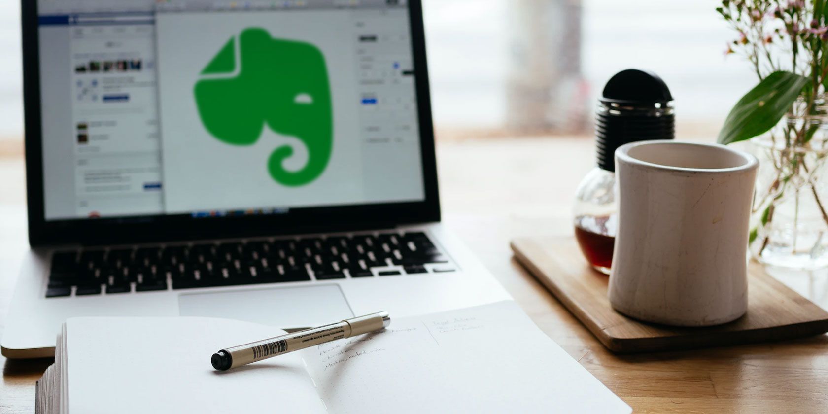 Evernote logo blurred on a laptop screen