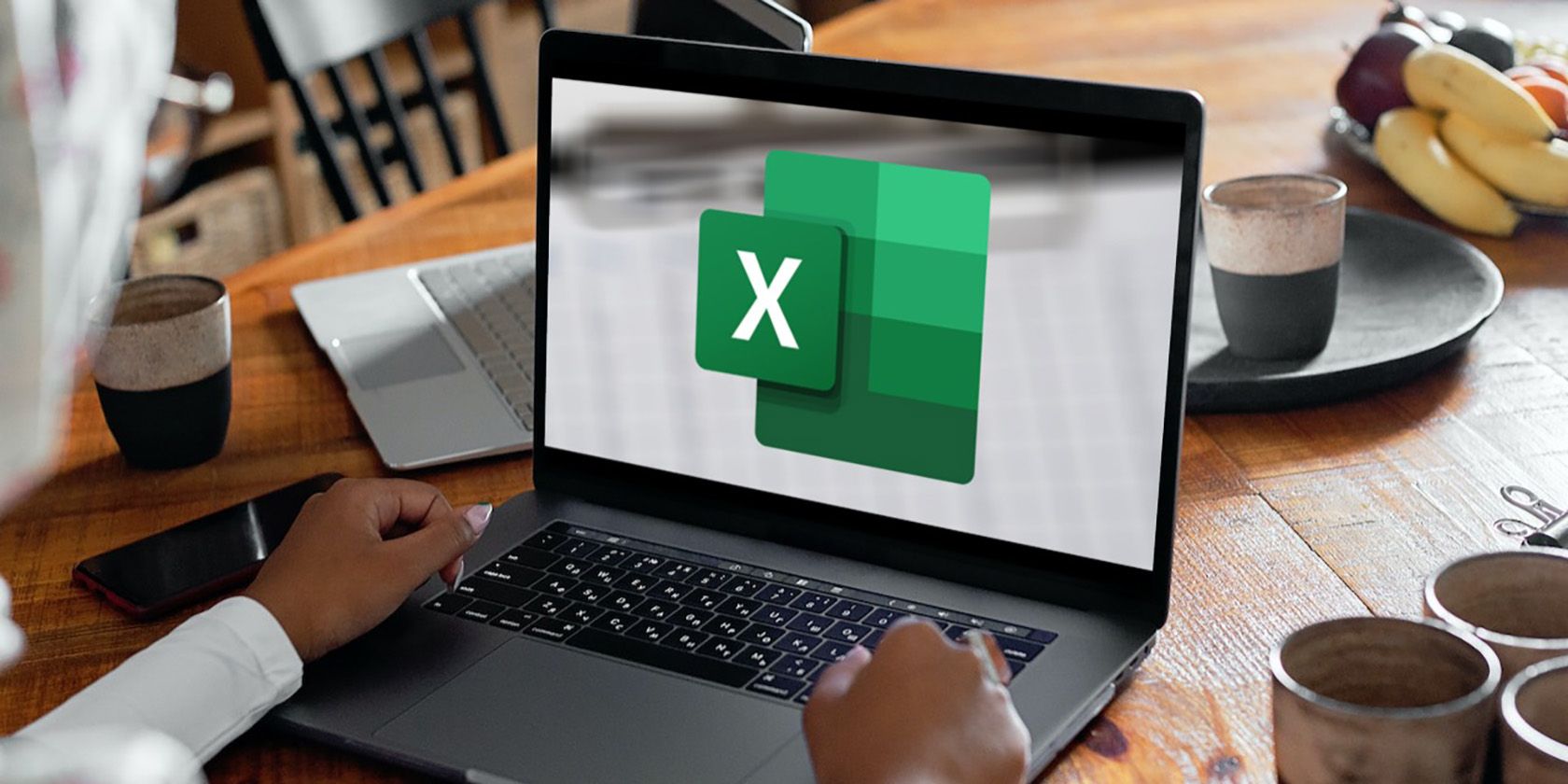 Excel logo displayed on a latop