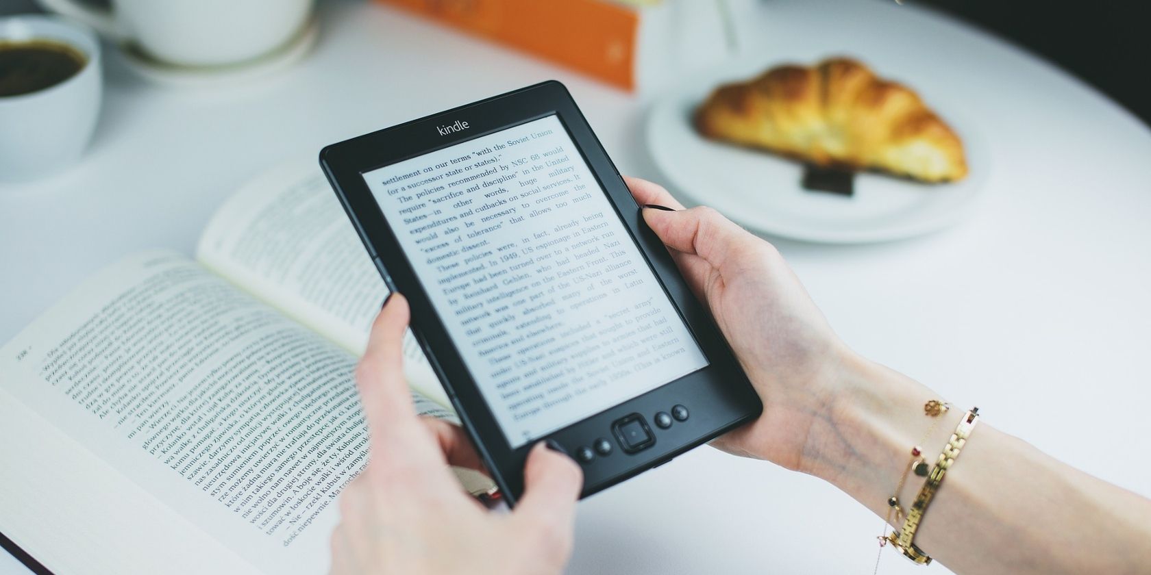 Person holding kindle ebook reader