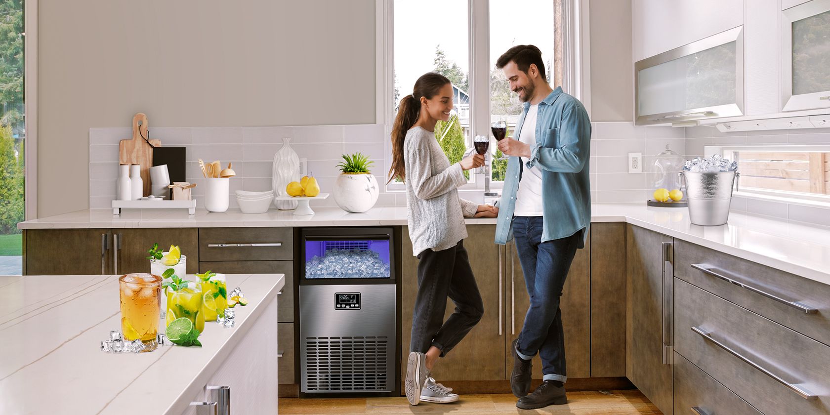 kismile ice maker with couple stood next to it in kitchen