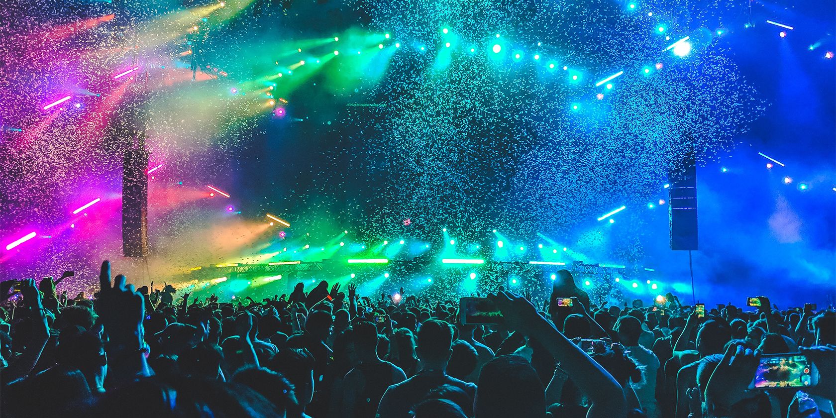 Large music concert with colourful confetti.