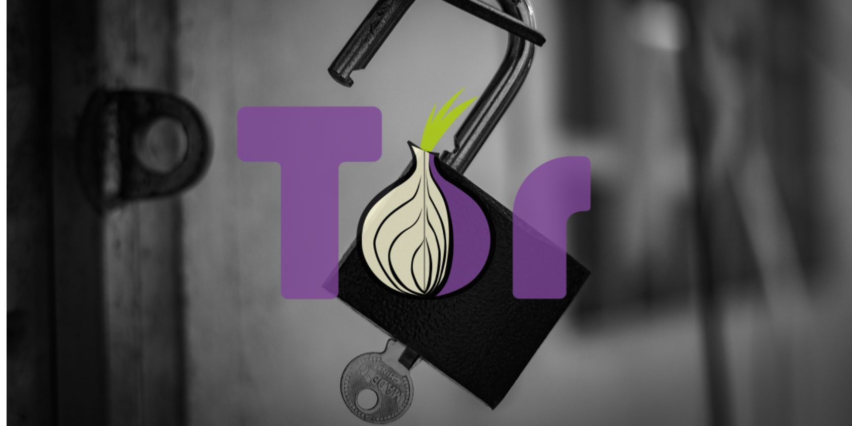 tor logo on front of unlocked padlock with key inserted