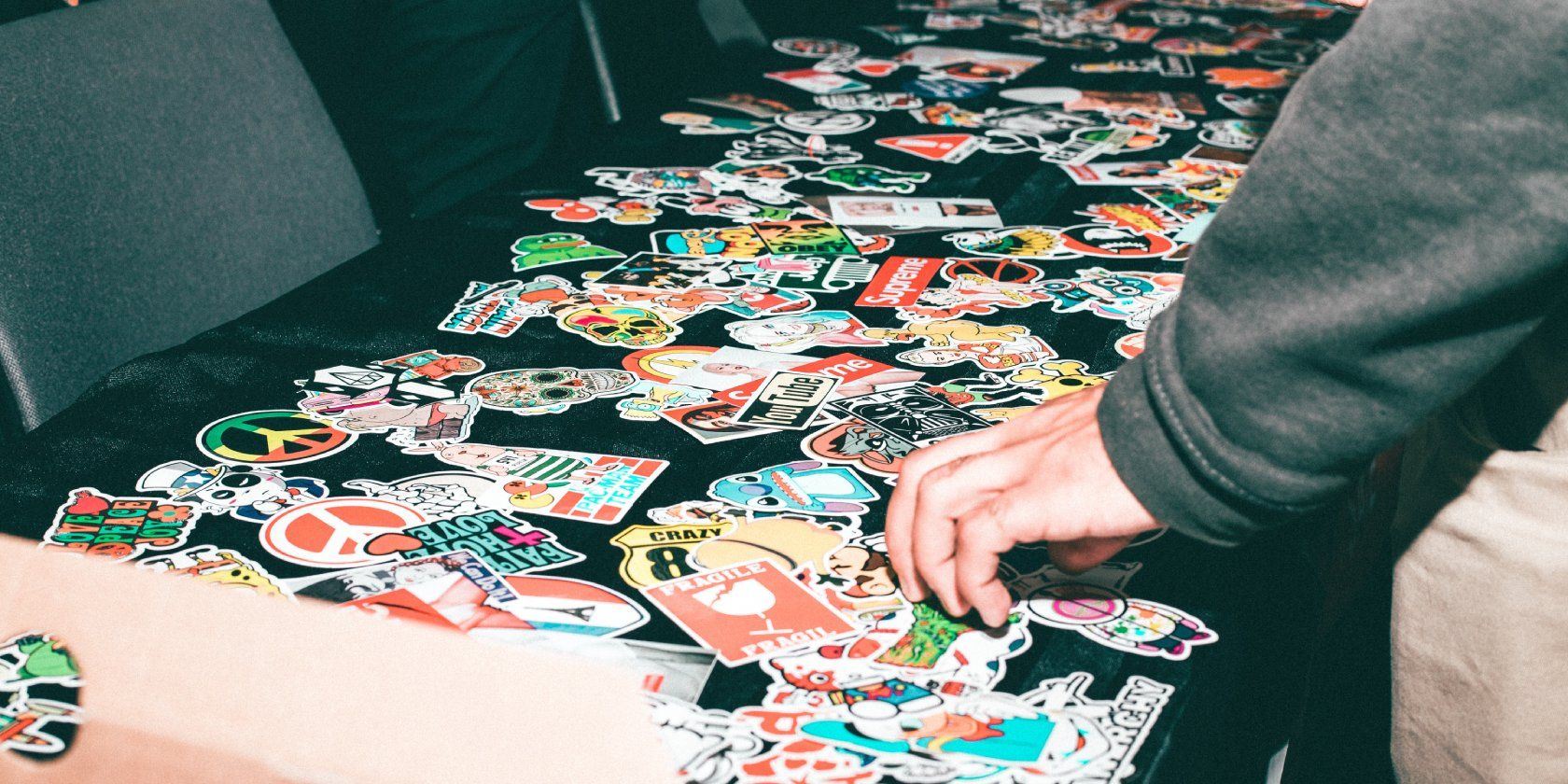 Photo Showing a Variety of Stickers on a Table