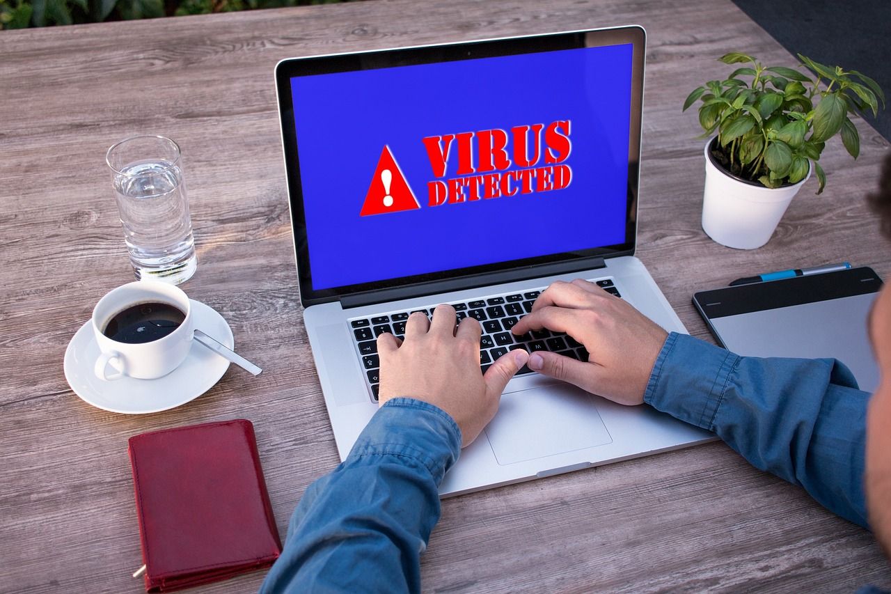 Virus computer warning on a laptop screen