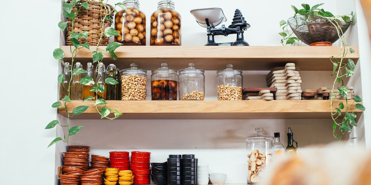 wooden shelves with glass jars