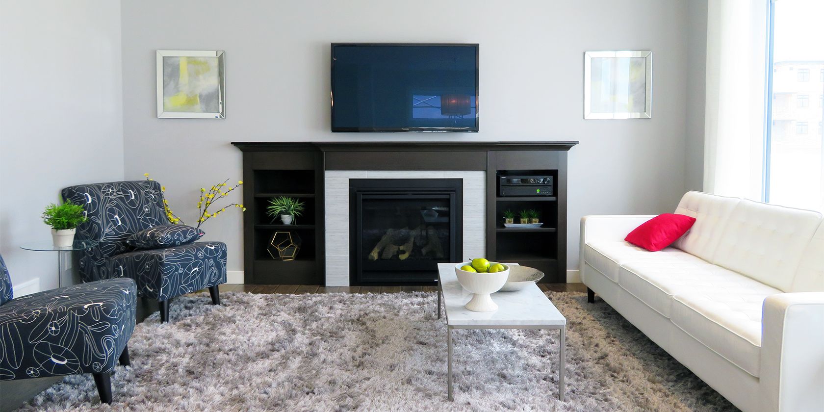 A TV placed above a fireplace and is too high for comfortable viewing