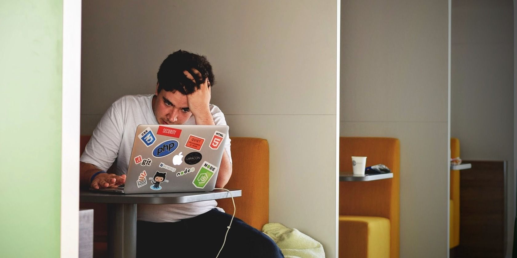 sad man in front of laptop
