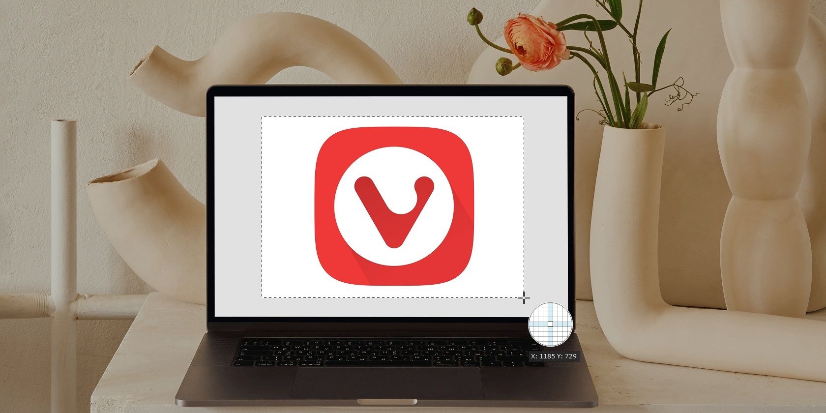 Laptop with Vivaldi Logo has Screenshots Taken
