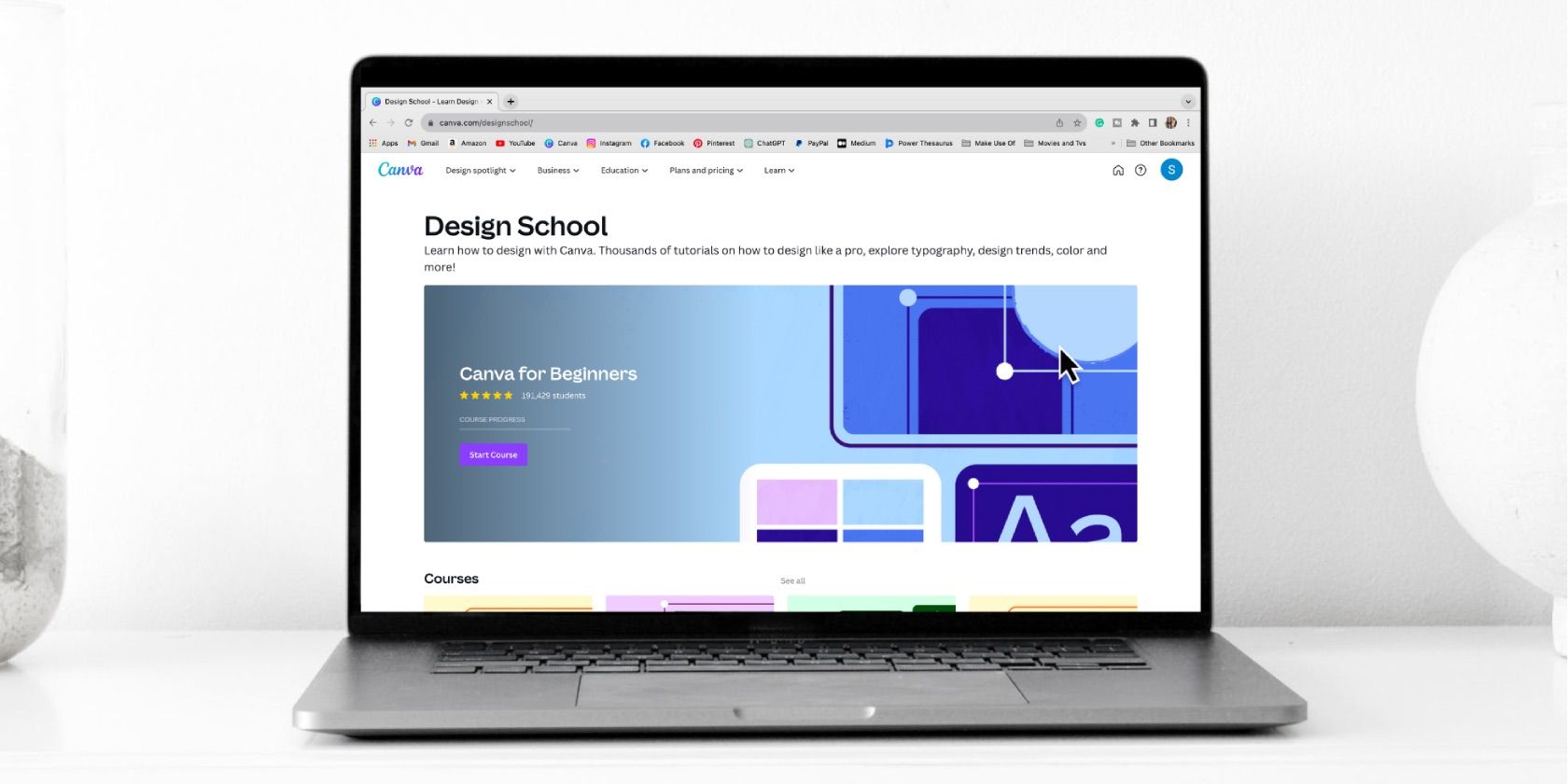 Canva Design School website on laptop