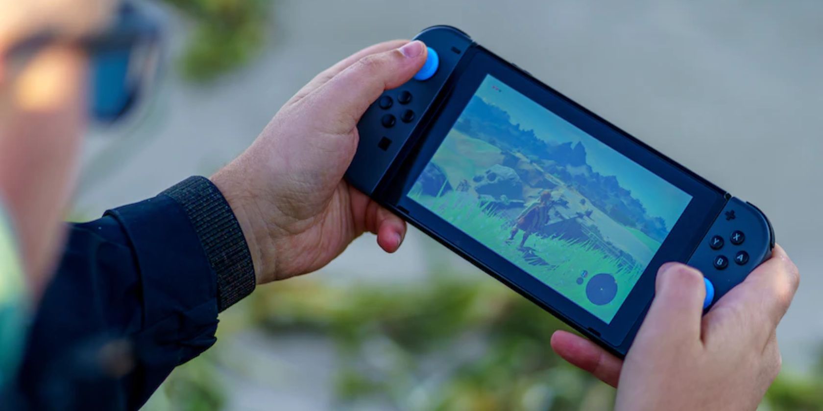 Somebody playing a game on a Nintendo Switch