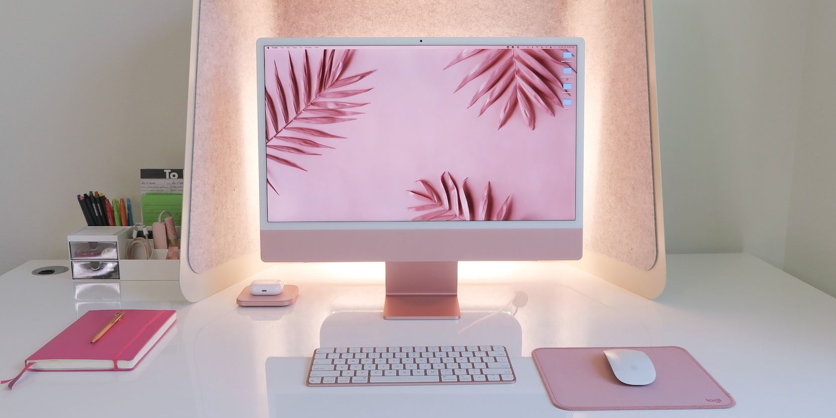 iMac on a desk with pink aesthetic