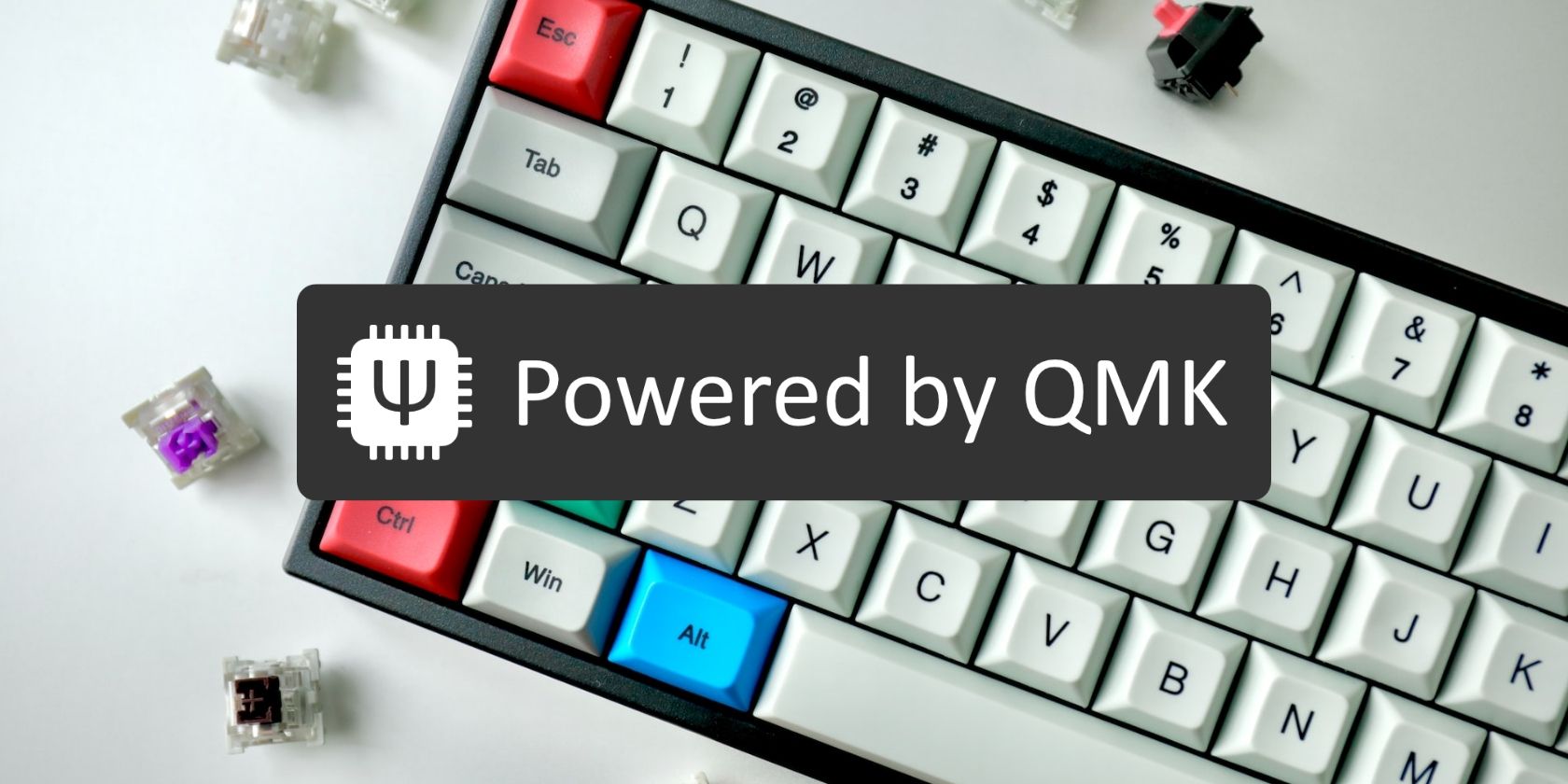 QMK Logo over a mechanical keyboard