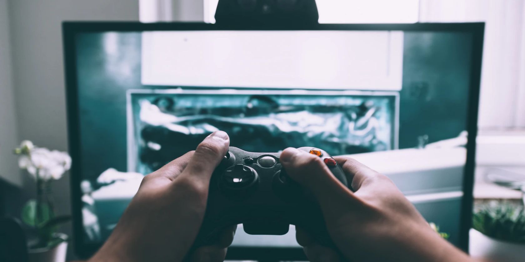 man playing game with controller