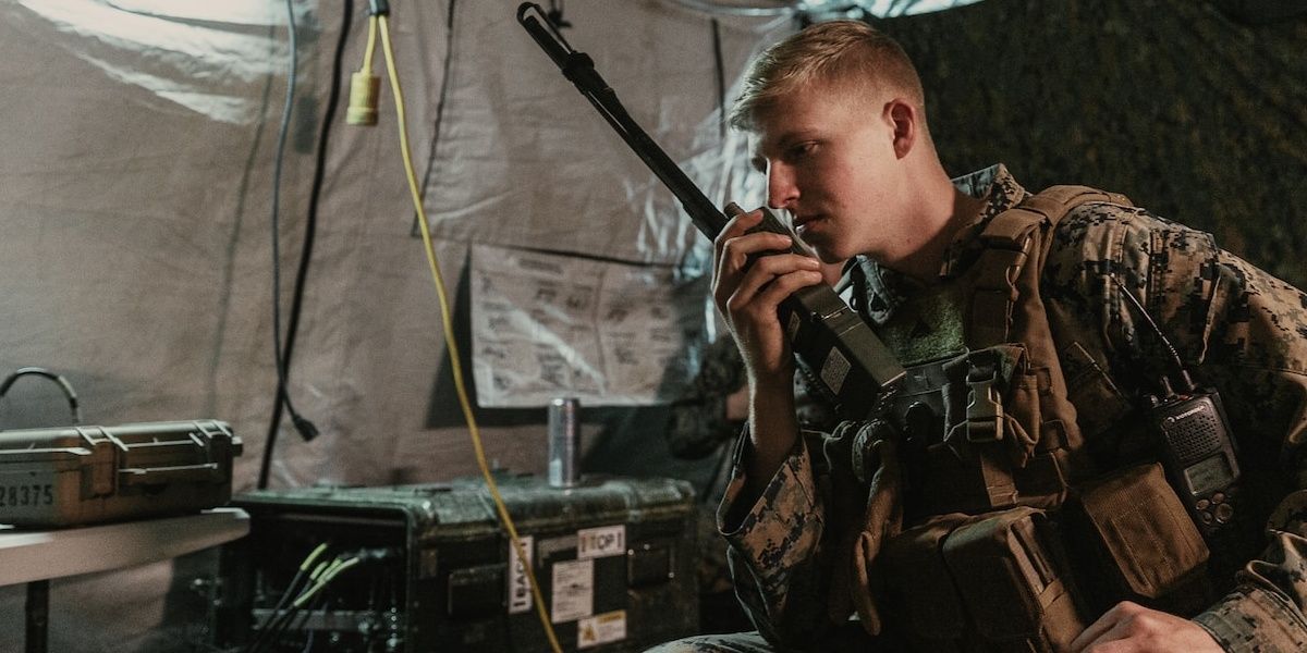 soldier-communicating-via-walkie-talkie