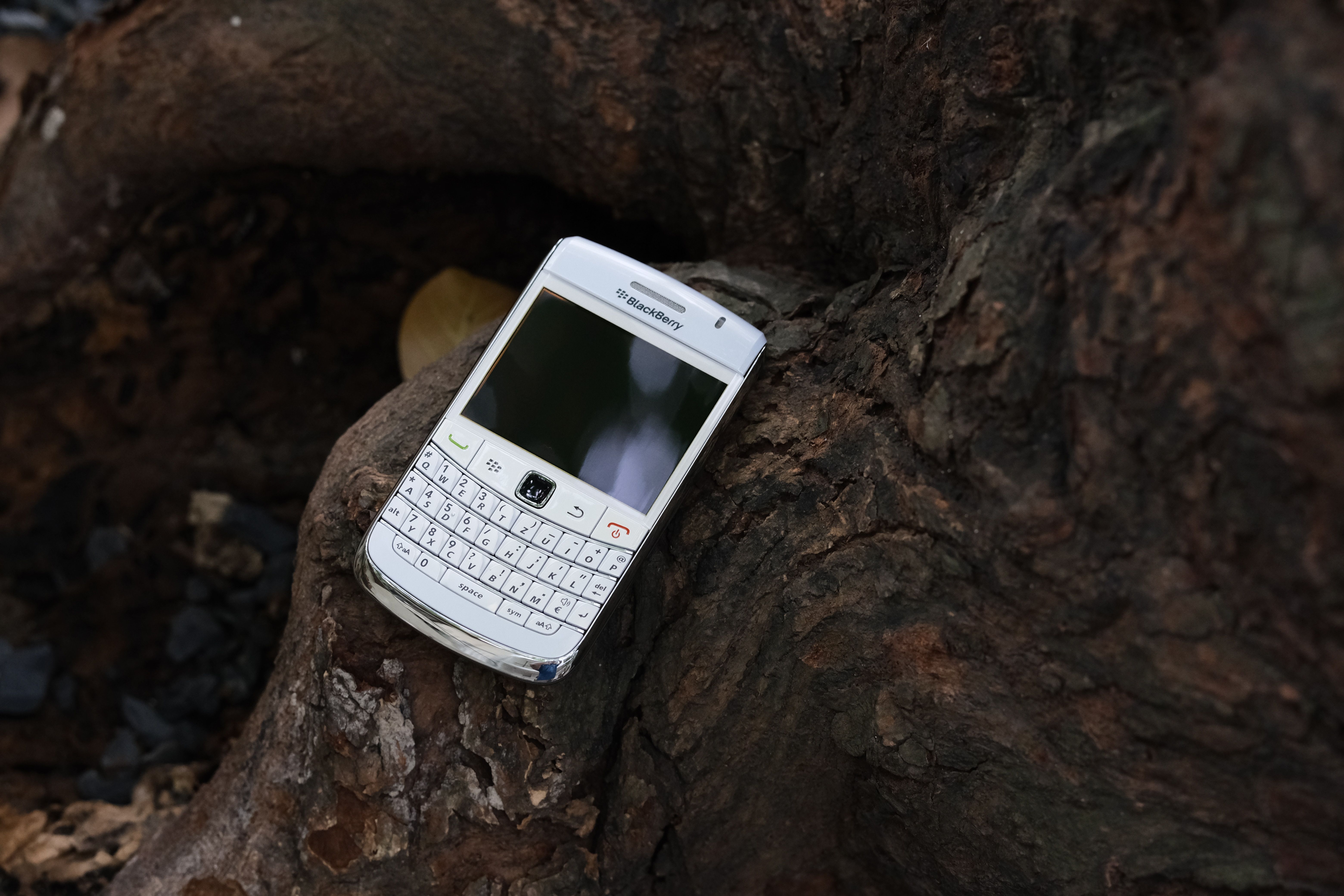 a blackberry phone on a rock