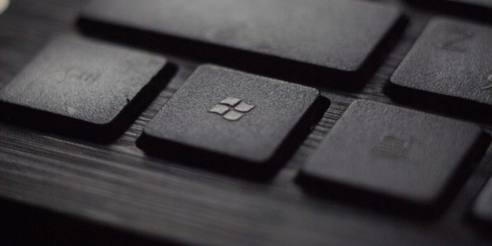 black keyboard key with windows logo engrained