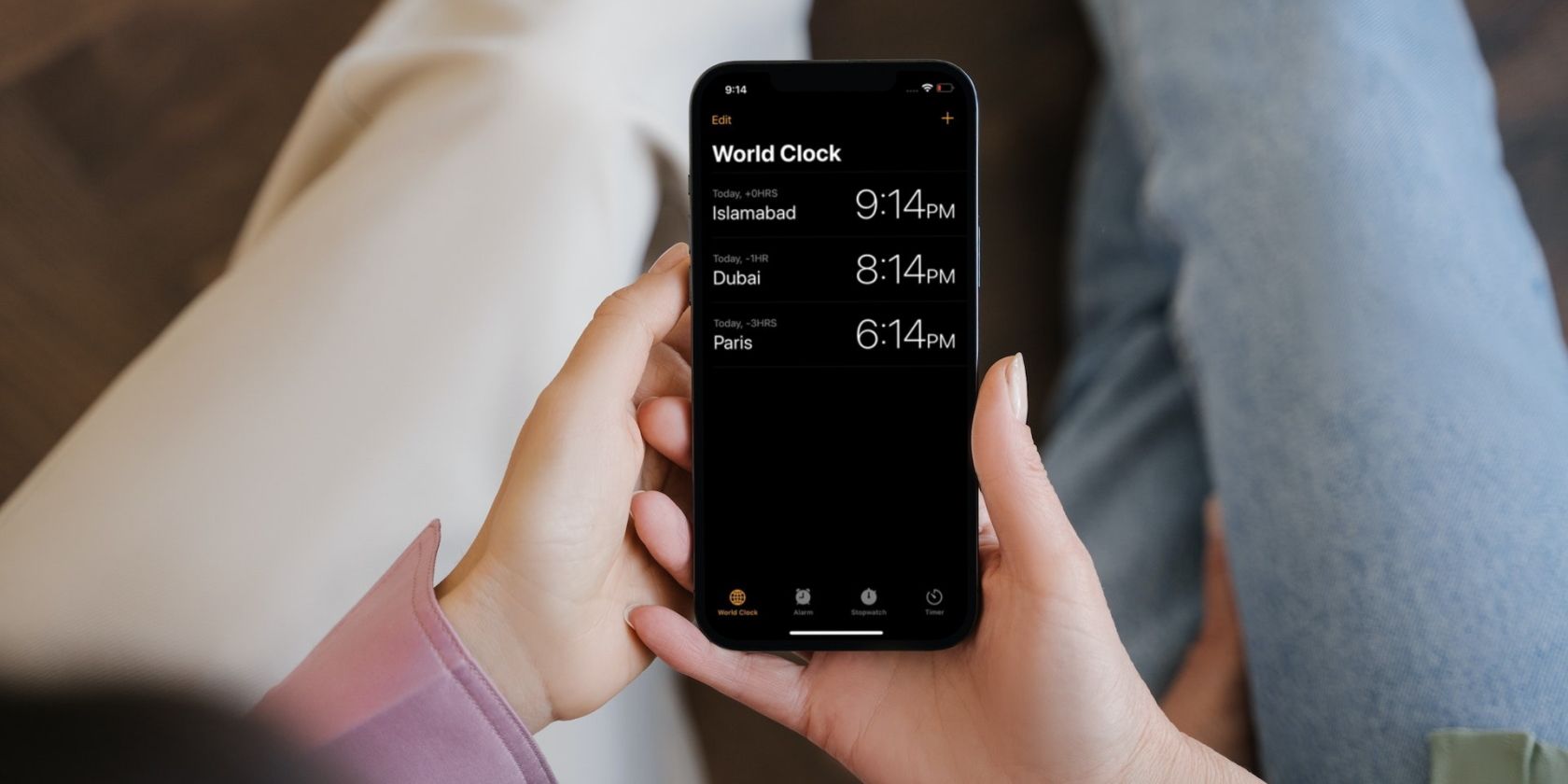 Clock app on iPhone displaying multiple time zones