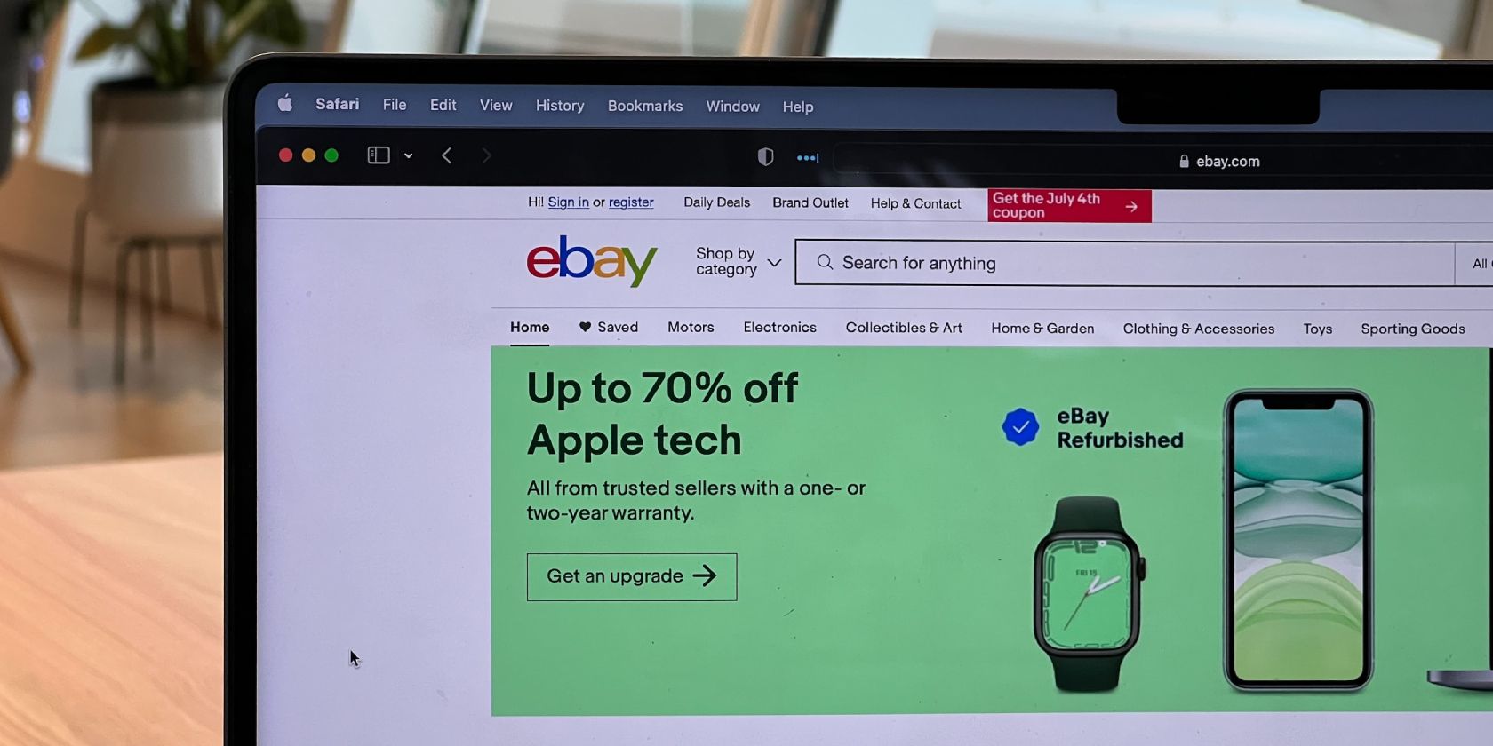 eBay's homepage opened on a laptop