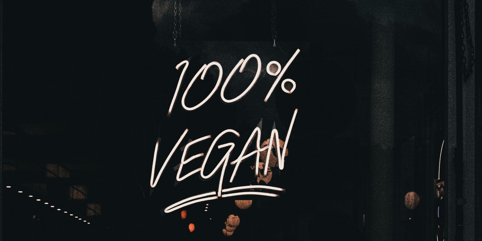 Neon that reads 100 percet vegan