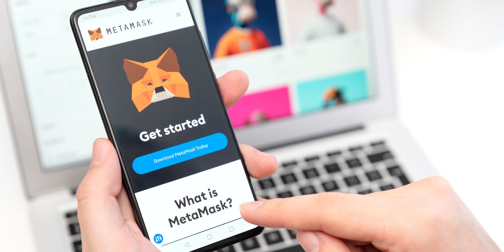 person using metamask wallet on smartphone feature